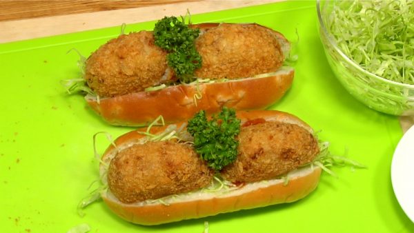 Place the korokke on top. Finally, garnish with parsley leaves. You can also toast the bread before you add toppings.