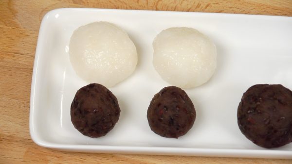 Repeat the process and make another rice ball. This size of the rice balls will be used for the soy bean and sesame botamochi.