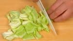 Next, cut the cabbage leaf into small pieces. One of the great benefits of cabbage is cancer prevention.