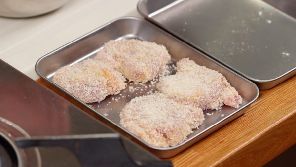 Repeat the process and make 4 slices of breaded pork.