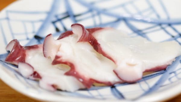 Dip the slice in wasabi soy sauce and enjoy the octopus. It is so juicy and has a chewy texture. So delicious!