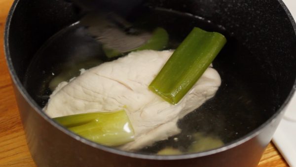 Now, remove the chicken breast from the pot.