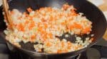 Add the chopped onion, carrot and celery. Saute the vegetables on high heat but you don't need to caramelize them.