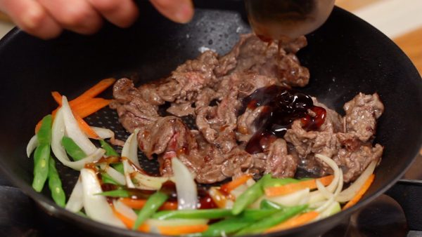 Add half the teriyaki sauce to the vegetables and half to the meat.