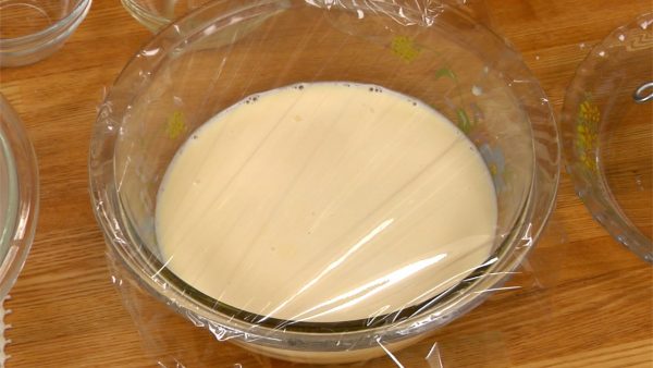 Cover with plastic wrap. Allow it to rest for 30 minutes at room temperature. Allowing the batter to rest will make it smooth and spread more evenly onto the pan. Store the batter in the fridge if you need to leave it for more than 30 minutes.