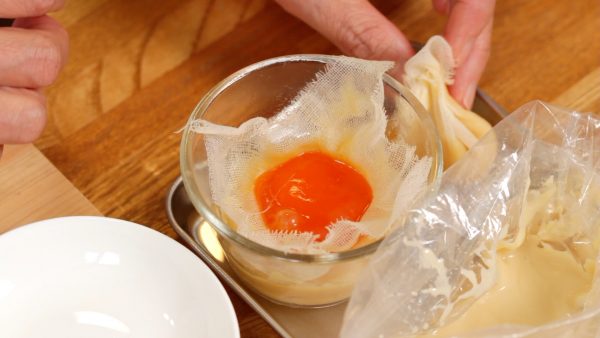 Next, carefully remove the egg yolk.