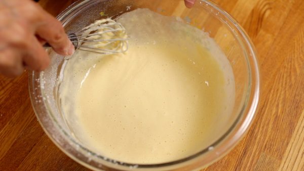 Mix the batter until all the pockets of dry flour have disappeared.
