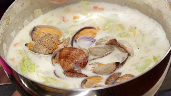 Add the clams and the butter. When the clams warm up, turn off the burner.