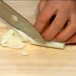Cut the naganegi, long green onion thinly using diagonal cuts.