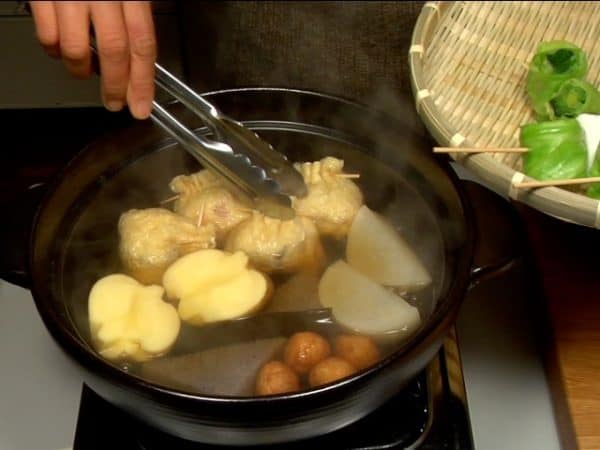 Then, add the takarabukuro, potato, and small nerimono, cover and simmer for 15 more minutes.