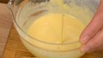 Add a sprinkle of water and allow the batter to reach the desired consistency as shown in the video.