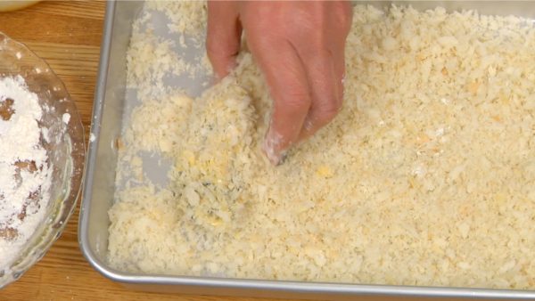 Cover with bread crumbs and gently press.