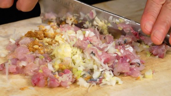 Lightly combine the mixture. Then, chop it with a knife.