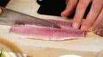 To remove this, cut out the middle of the fillet lengthwise.