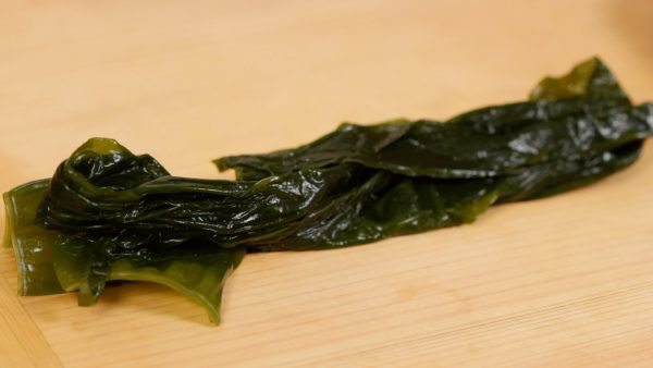 Next, rehydrate the wakame seaweed and cut it into 3 cm (1.2") pieces. Be careful not to over-soak the seaweed otherwise it will become soggy.