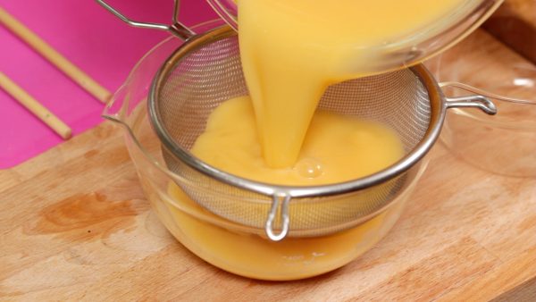 Strain the egg mixture. This will help the egg custard to have a smooth texture.