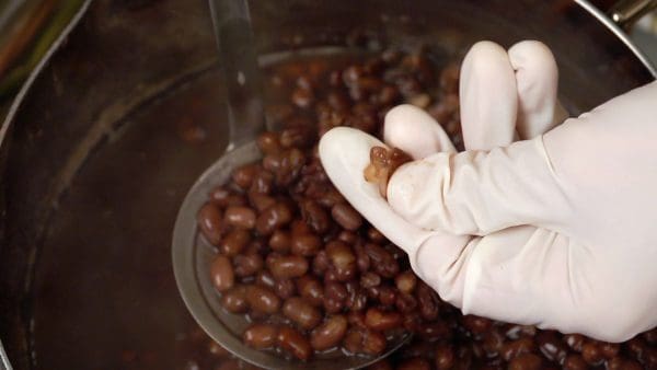 Now, pinch a couple of beans and check if they can be easily crushed.