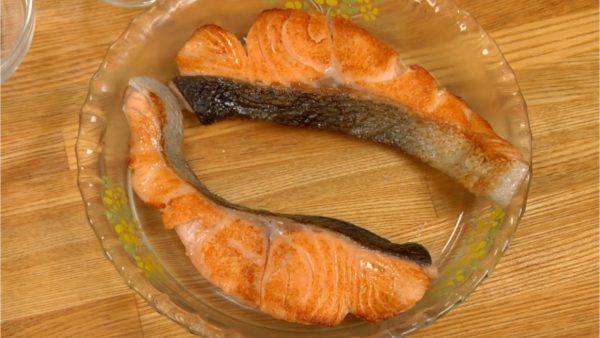 Turn off the burner and place the salmon onto a plate.