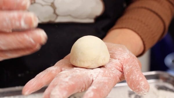 If the anko is too soft to wrap with the dough, cover the anko with a paper towel and leave it in the fridge until it becomes firm enough to handle.