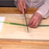 Cut the sping onion leaf in 4 pieces.