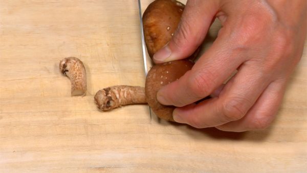 Remove the stems of the shiitake mushrooms.