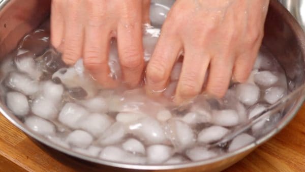 Quickly rinse the fish in a bowl of ice water. This will help to reduce the fat and fishy smell.