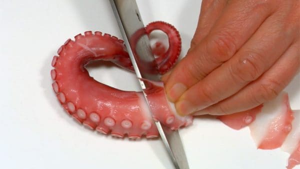 Slice the boiled octopus into 2-3 mm (0.1") slices.