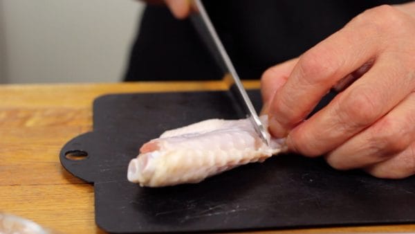 Cut between the joints with a kitchen knife to detach the tip.