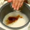Add water, granulated kombu dashi powder, sake and soy sauce.
