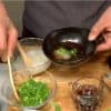 While heating the broth, serve the ponzu sauce in a small bowl and add the grated daikon and chopped spring onion leaves.
