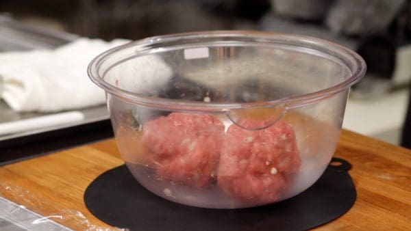 Divide the mixture into two equal portions. Then, roll each portion into a ball.