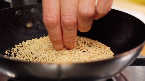 Heat until the sesame seeds feel hot to the touch with your fingers.