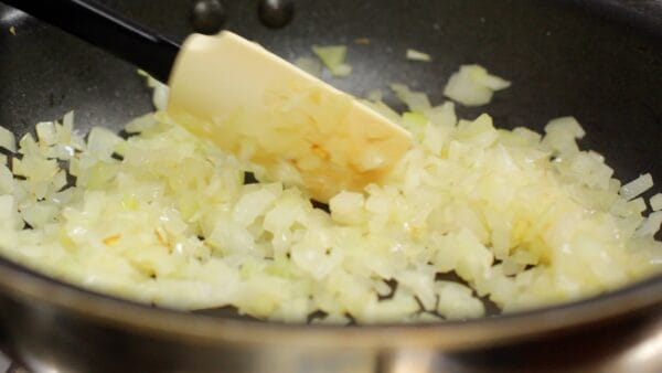 Saute the onion until the moisture is reduced and the color turns translucent. The onion can be slightly browned.