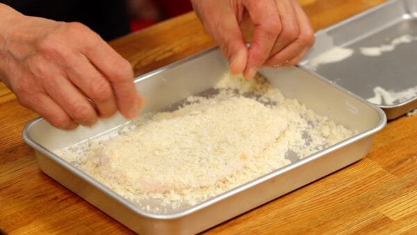 Flip it over and thoroughly cover the pork with breadcrumbs again.