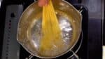 First, let's prepare the cold pasta. Add 1% salt to a generous pot of water and bring it to a boil.