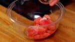 Transfer them to a bowl. Add 1g (0.04 oz) of salt.