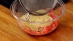Add the pasta to the semi-frozen tomato and lightly mix to chill the pasta.