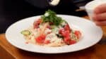 Sprinkle on a generous amount of Parmesan cheese. Drizzle with olive oil. 