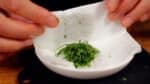Place it between paper towels to absorb any remaining moisture.